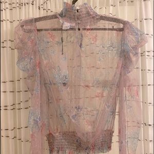 Sheer mauve lace pouf sleeve rouged turtle neck